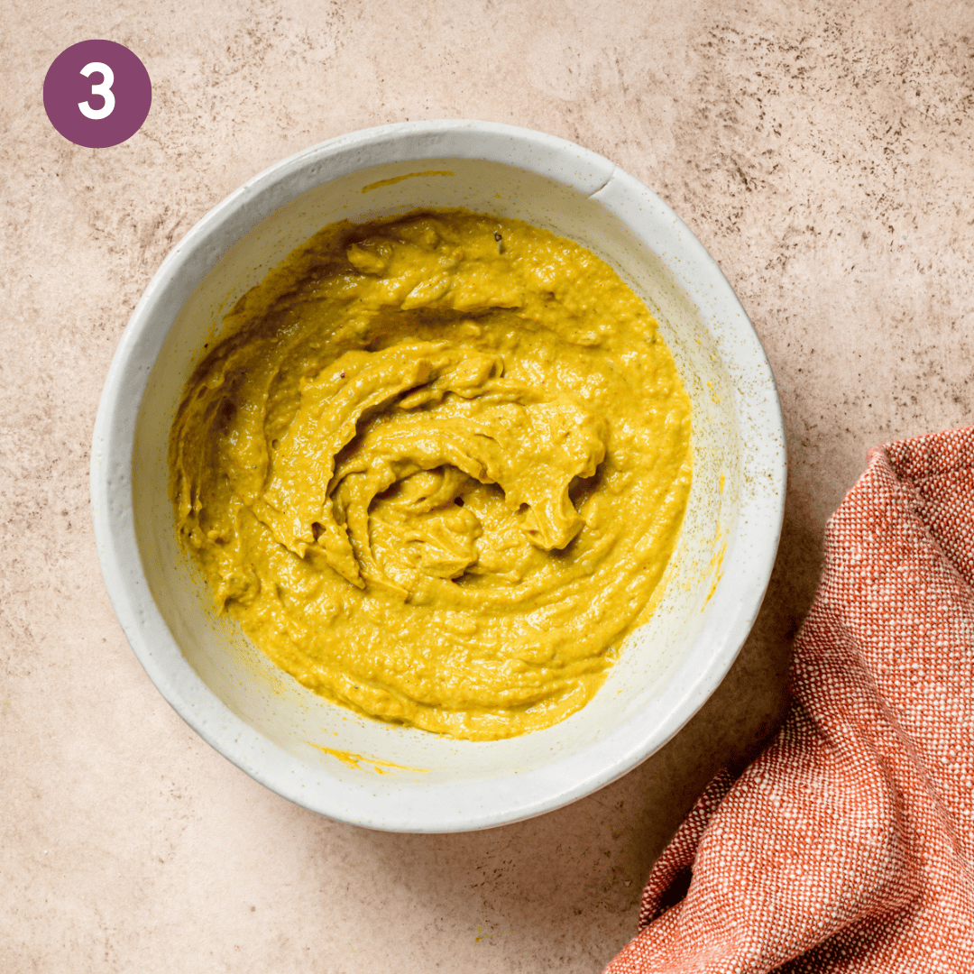 egg salad sauce in a small bowl after being combined.