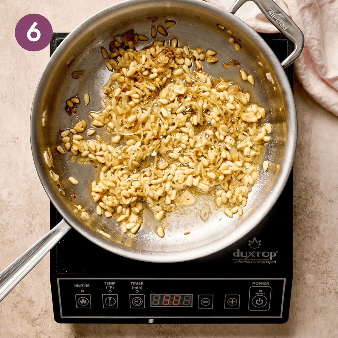 Browned pine nut and shallot garlic mixture.