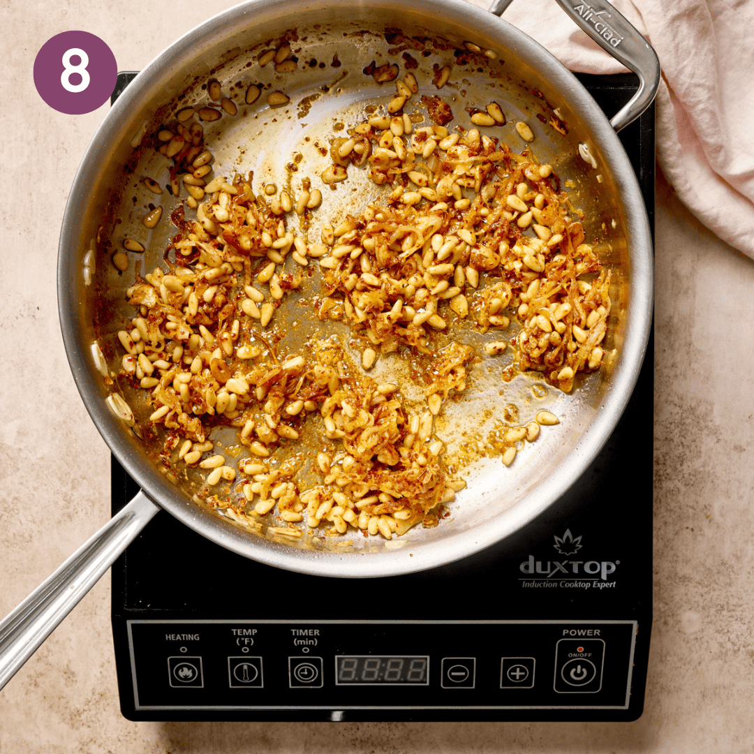 Cooked pine nut mixture in the pan.